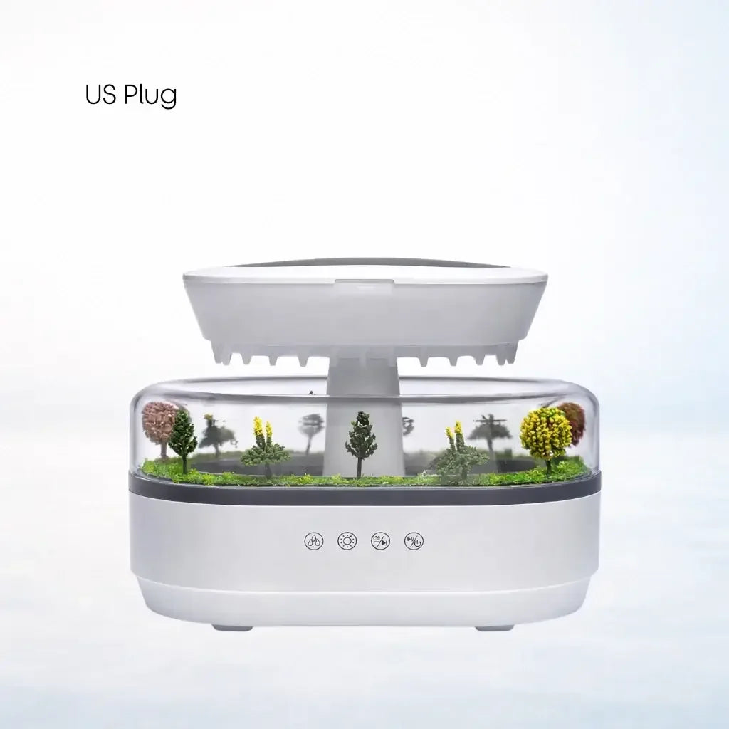 Aroma raindrop humidifier with US plug, white modern design, transparent dome with miniature trees.
