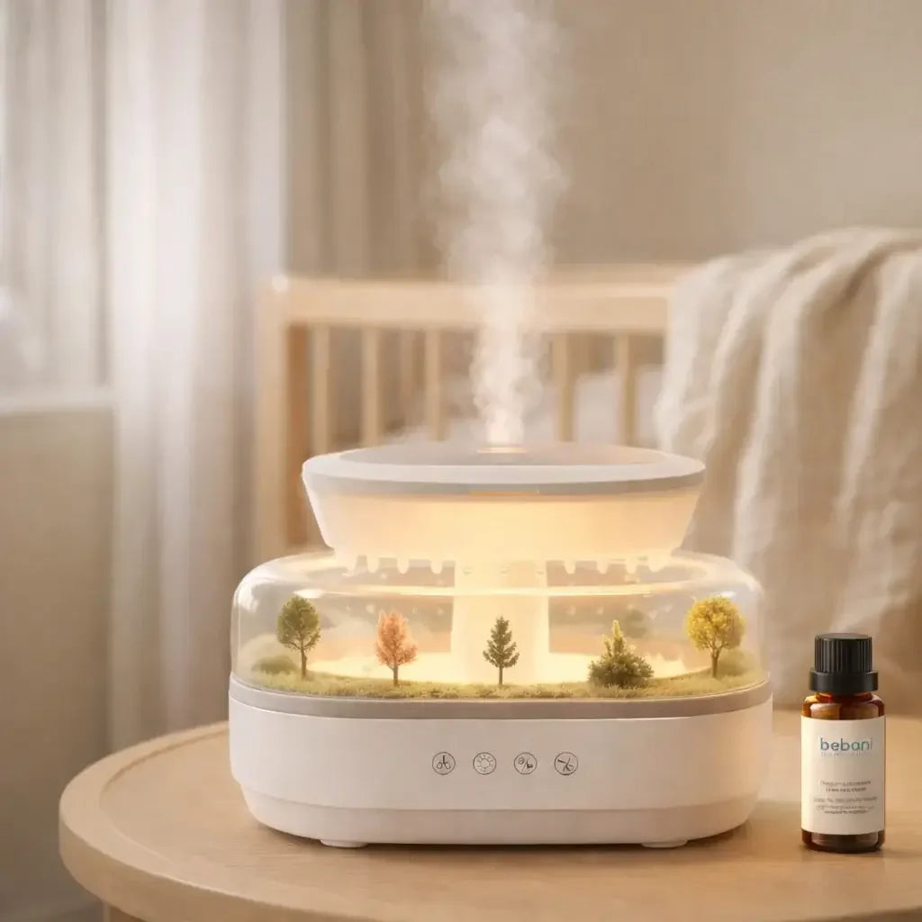 Yellow aroma raindrop humidifier with soft light, mini tree landscape, and essential oil bottle