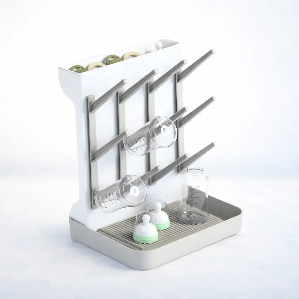Baby bottle drying rack with vertical pegs, holding bottles, nipples, and accessories.