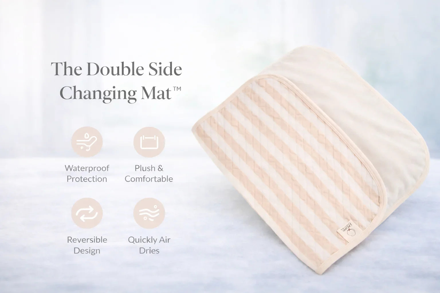Double-sided changing mat with beige and white stripes, waterproof, reversible design.
