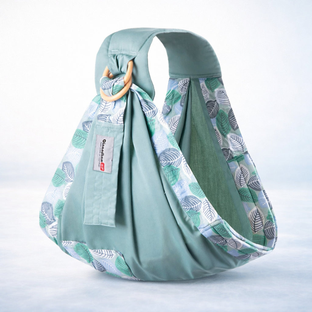 Embrace Wrap - Green Embrace Wrap™ baby wrap newborn sling with leaf pattern, ergonomic and breathable for newborn and toddler carrying.