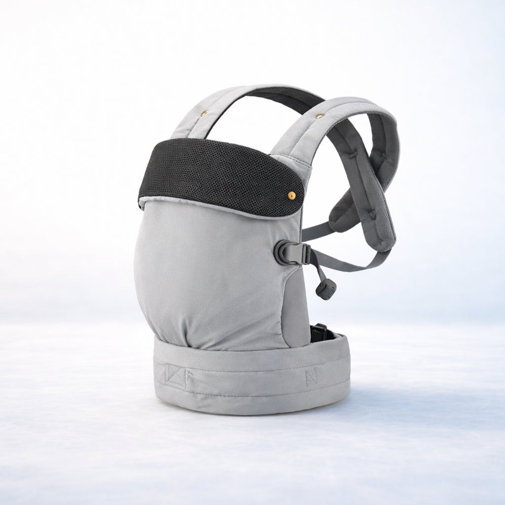 Little Carrier - Gray baby carrier with black accents on a light gray background