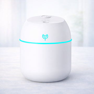 Mist Mini™ - Compact Mini USB Humidifier Diffuser for comfortable air, suitable for bedrooms and offices with calming lighting and quiet operation.