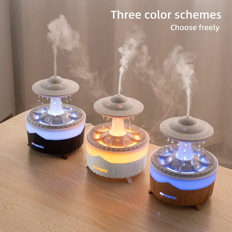 Three UFO-shaped humidifiers with LED lights in different colors emitting mist on a wooden table.