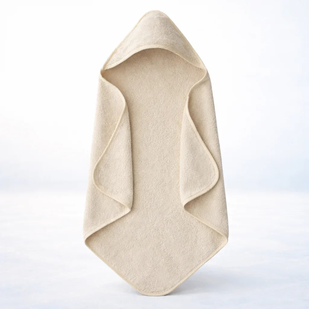 Baby Hooded Towel - Soft beige hooded wrap towel with a textured finish, displayed against a white background