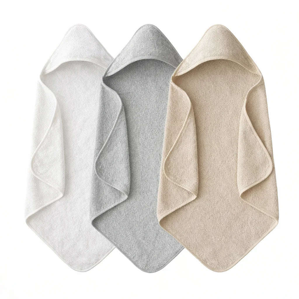 Baby Hooded Towel - Set of three hooded bath towels in white, grey, and beige, soft textured fabric