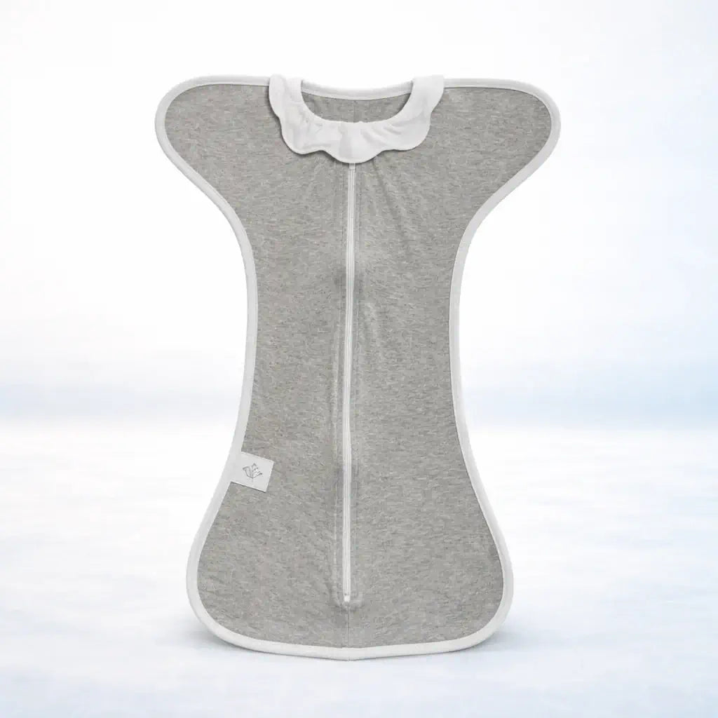 The Sleep Nest - Gray newborn sleep sack made from soft, breathable cotton, featuring a secure zip closure for gentle comfort and safe sleep.
