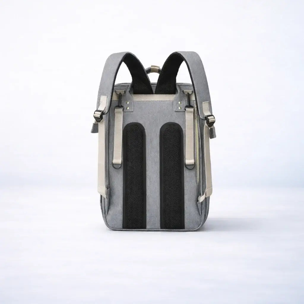 The All-In-One Diaper Bag Gray backpack with black and beige accents on a white background