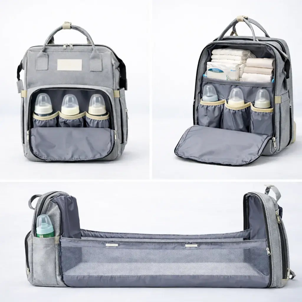 The All-In-One Diaper Bag Gray diaper bag with multiple compartments and baby bottles on a white background
