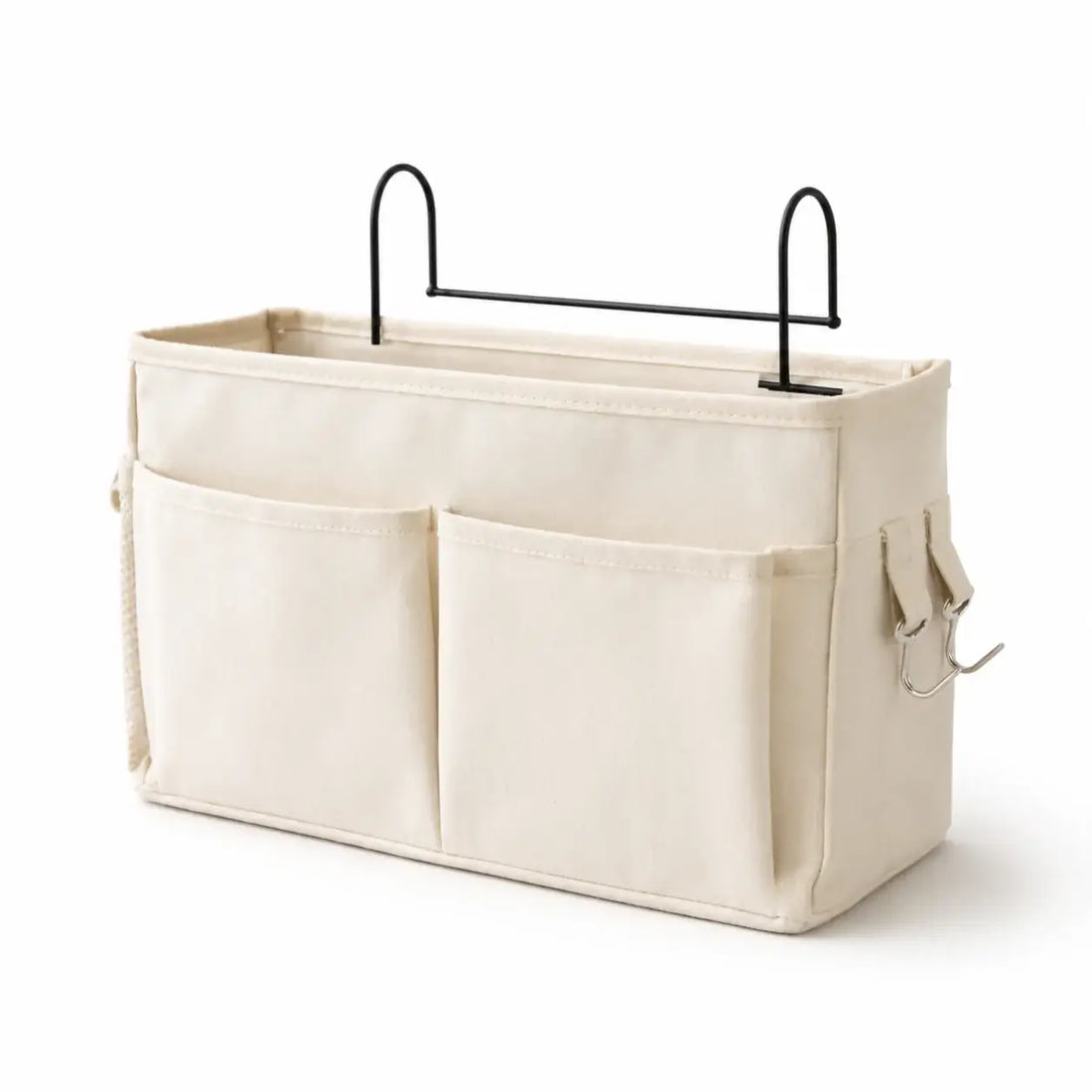 Beige fabric caddy with multiple pockets and a black metal rod on a white background