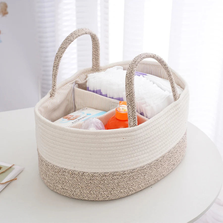 Cotton rope diaper basket holding diapers, wipes, and baby essentials