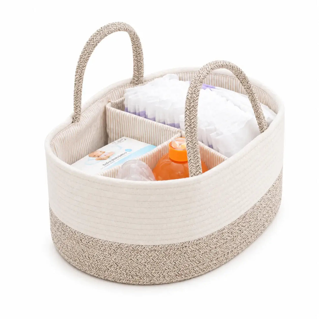 Beige woven baby caddy with diapers, wipes, and a bottle on a white background