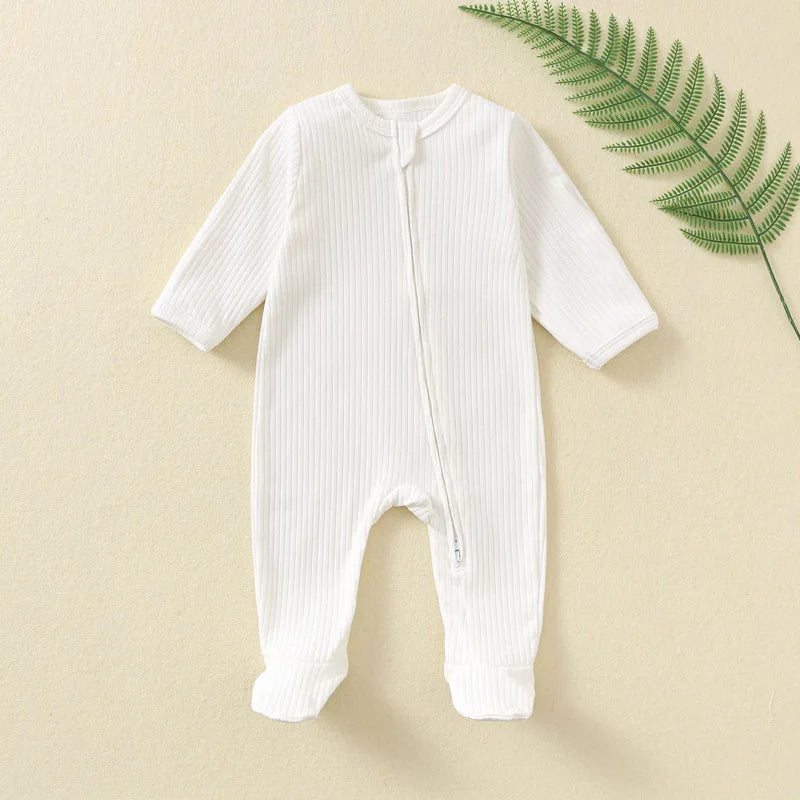 Organic Ribbed Zip Baby Romper - soft, breathable everyday wear for babies, made from 100% natural cotton, easy dressing, gentle comfort.