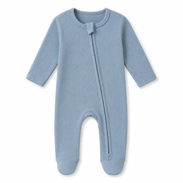 Blue baby onesie with a zipper on a white background