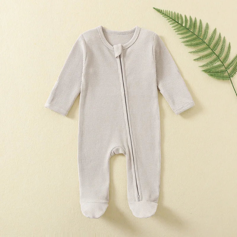 Organic Ribbed Zip Baby Romper - soft, breathable everyday wear for babies, made from 100% natural cotton with easy one-piece design.
