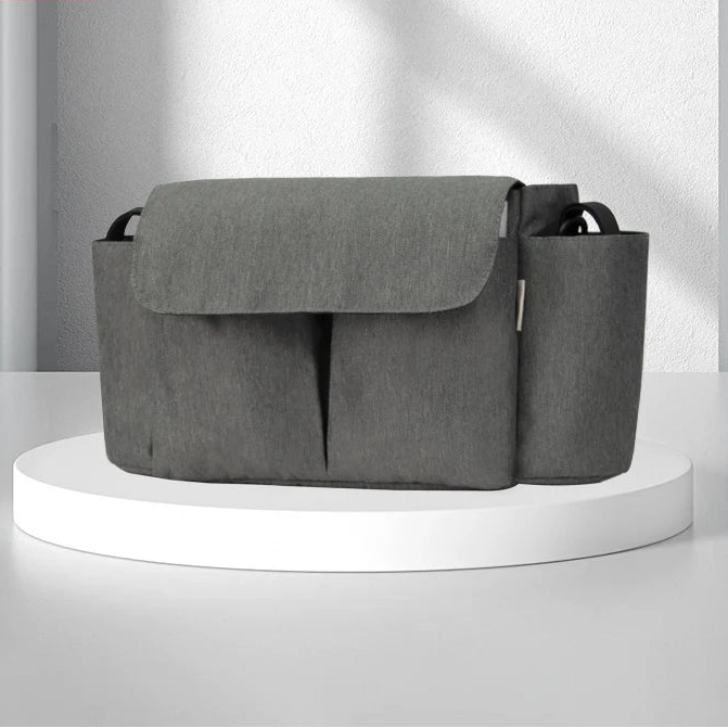 Stroller organizer with large capacity for easy storage, featuring spacious multi-compartment design for busy parents.