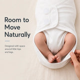 Adjustable Cotton Swaddle with room for baby's legs and hips to move naturally, promoting comfort and security.